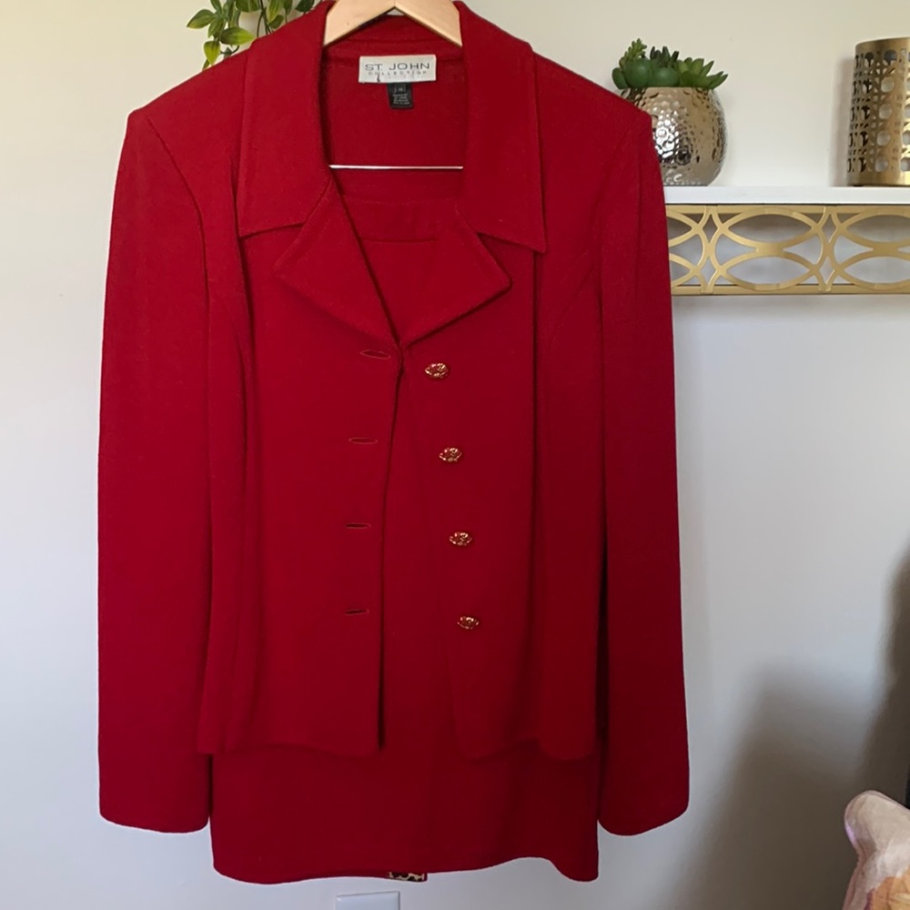 St.John Red skirt suit gold tone buttons on front and skirt slit placket.
